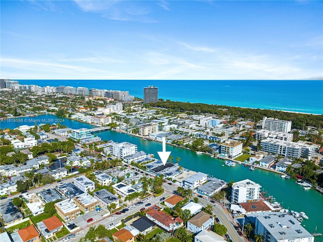 drone / aerial view with a water view