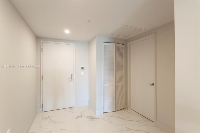 hallway with light tile patterned flooring