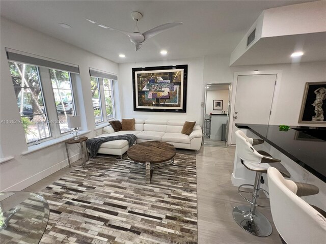 living room with ceiling fan