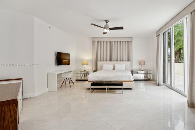 bedroom featuring ceiling fan and access to exterior