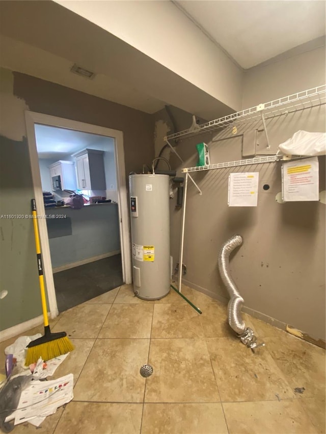 1926 Ramsey Dr, Lake Worth, FL 33461 - utility room with water heater