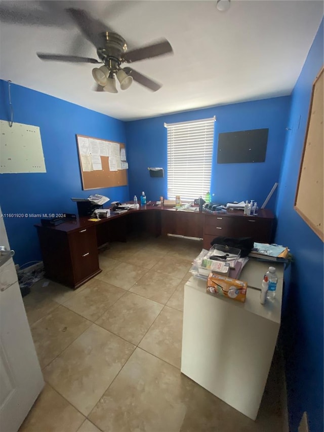 office area featuring light tile patterned floors and ceiling fan