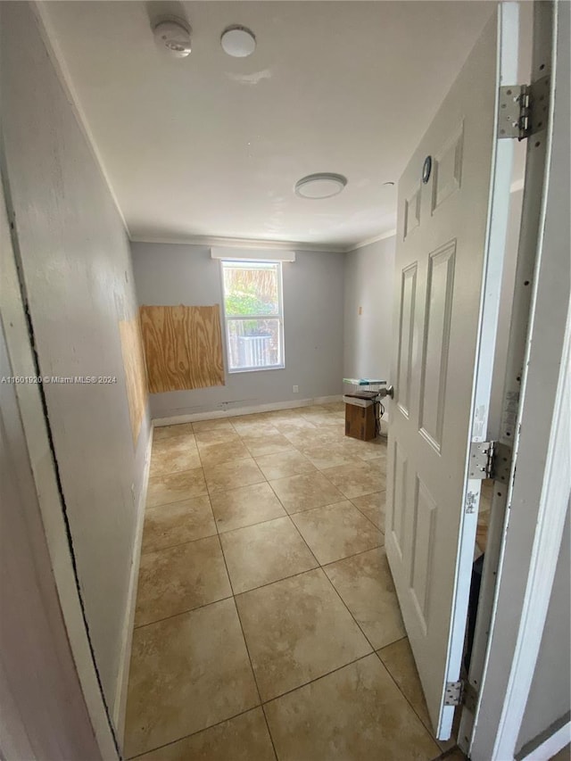 hallway featuring light tile patterned flooring