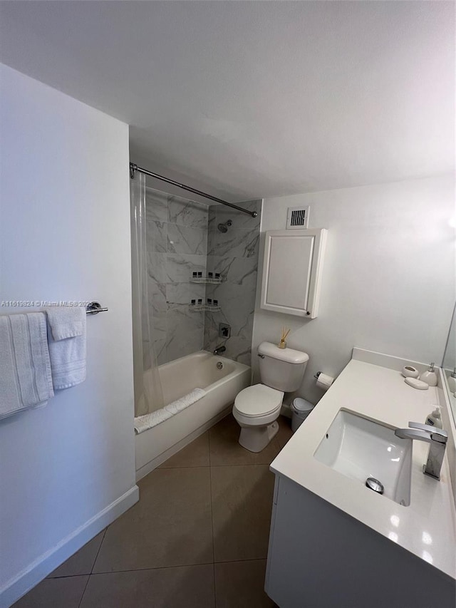 full bathroom with visible vents, toilet, tile patterned floors, tub / shower combination, and vanity