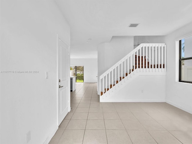 interior space with light tile patterned flooring