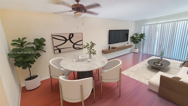 interior space with ceiling fan and hardwood / wood-style floors