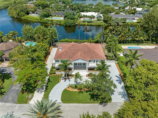 birds eye view of property featuring a water view