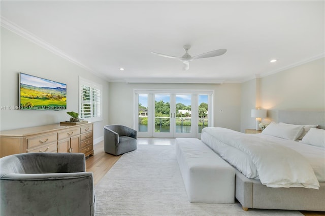 bedroom featuring french doors, access to exterior, light wood-type flooring, ceiling fan, and crown molding