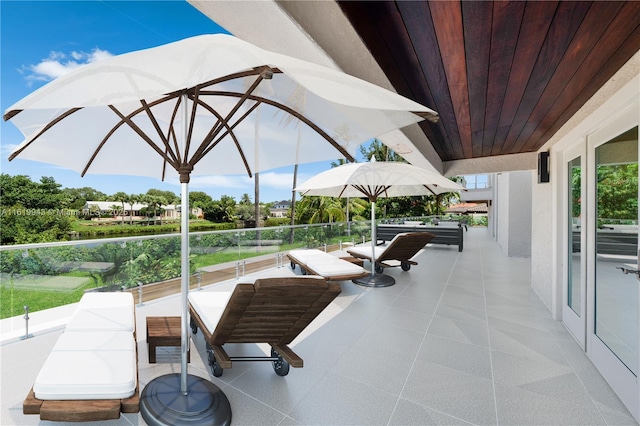 view of patio / terrace with a balcony