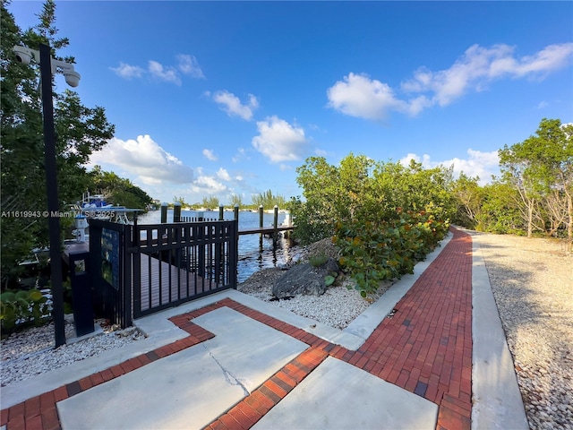 view of dock with a water view