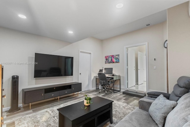 living room with hardwood / wood-style flooring