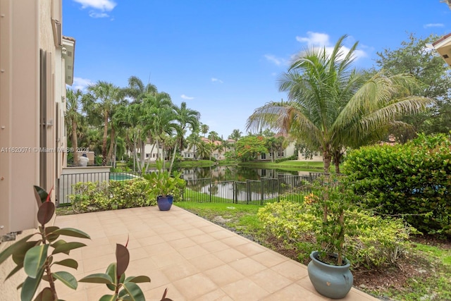 view of patio featuring a water view