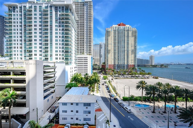 property's view of city featuring a water view