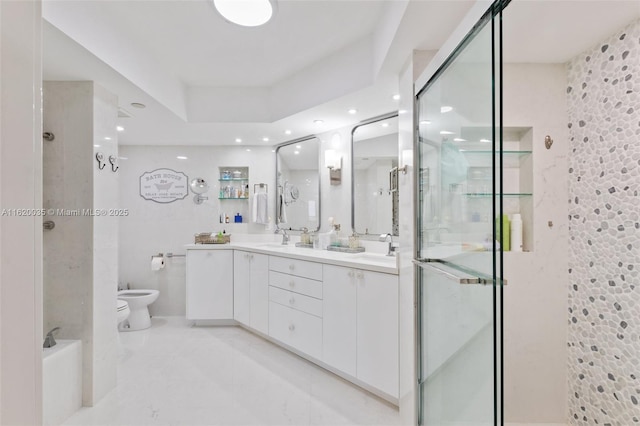 bathroom with a bidet, toilet, an enclosed shower, and vanity