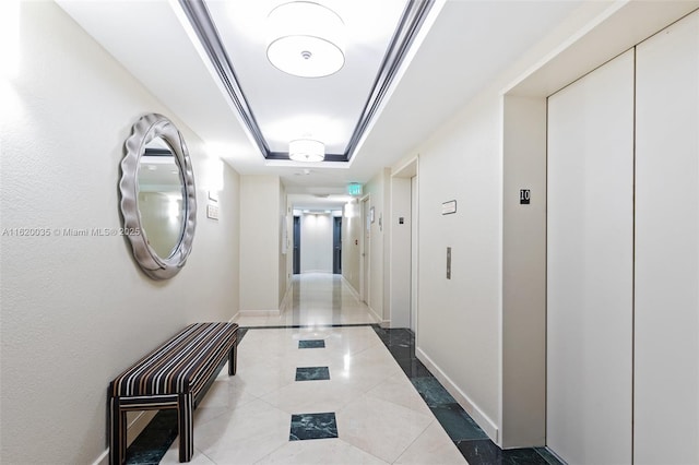 corridor featuring elevator