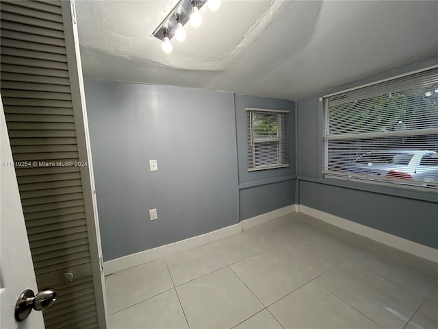 view of tiled spare room