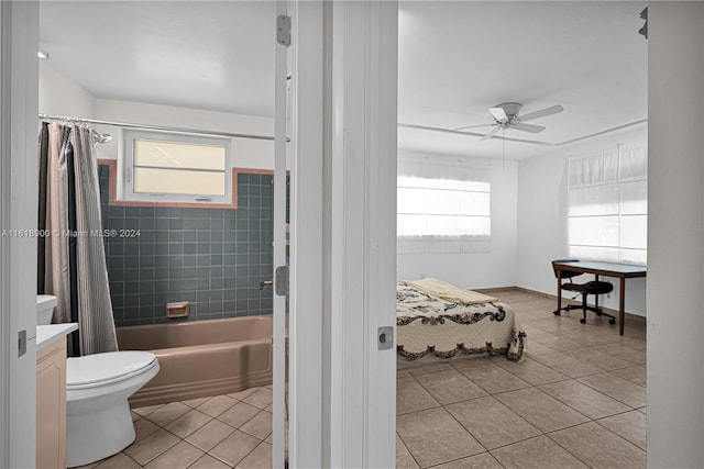 bathroom with toilet, shower / tub combo, tile patterned floors, and ceiling fan