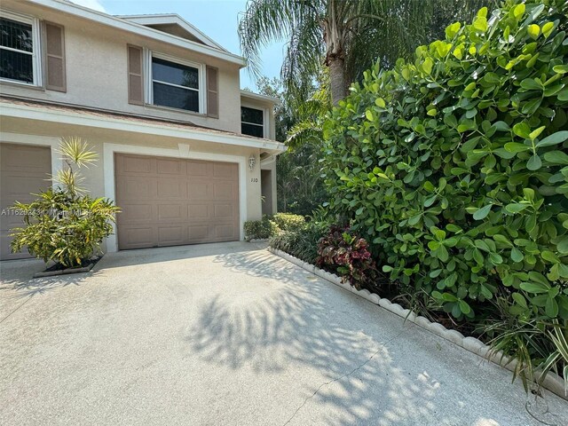 exterior space with a garage