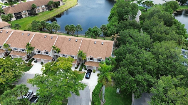 drone / aerial view with a water view