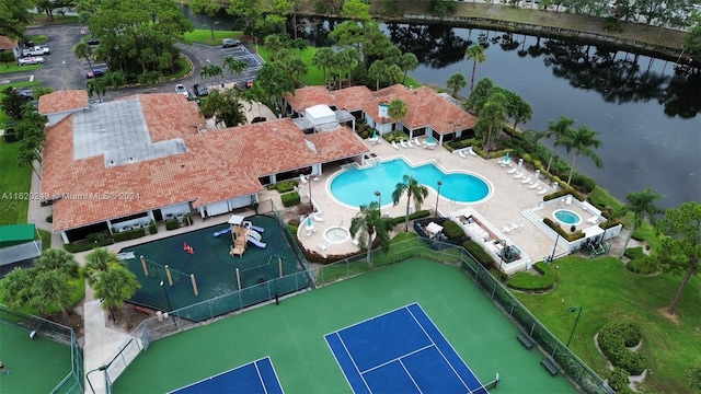 birds eye view of property featuring a water view