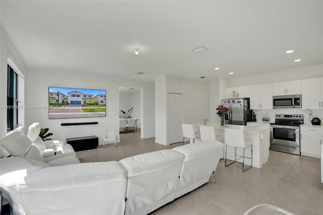 living area featuring recessed lighting