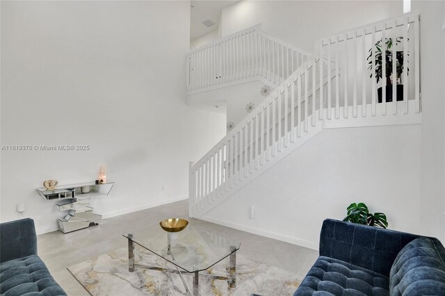 dining space featuring light tile patterned flooring