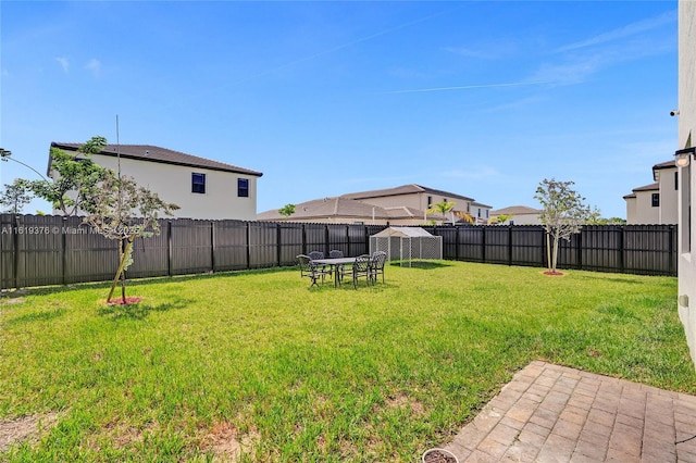 view of yard featuring a fenced backyard