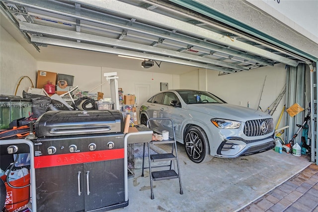 garage featuring a garage door opener