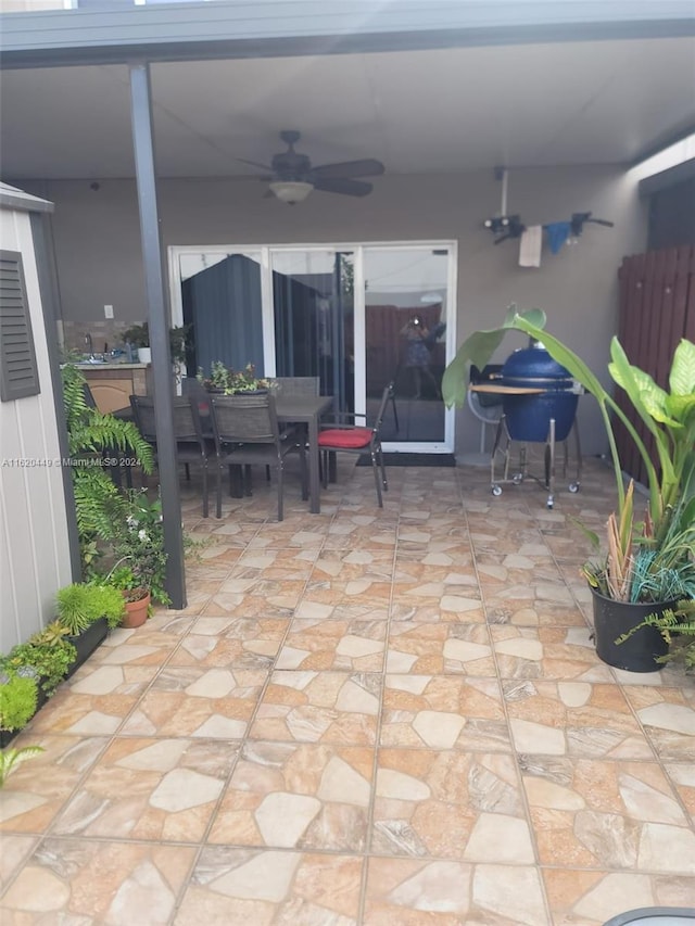 view of patio with ceiling fan