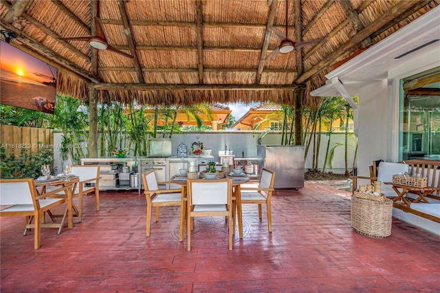 view of patio featuring a gazebo and ceiling fan