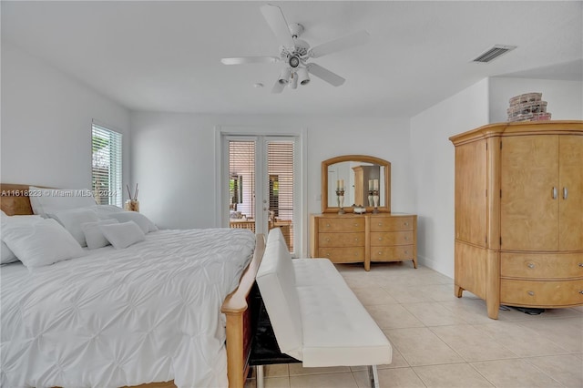 bedroom featuring access to outside, ceiling fan, and light tile patterned flooring