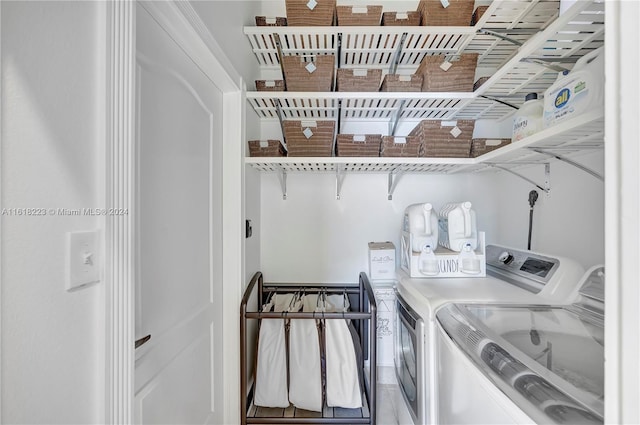 laundry area with separate washer and dryer