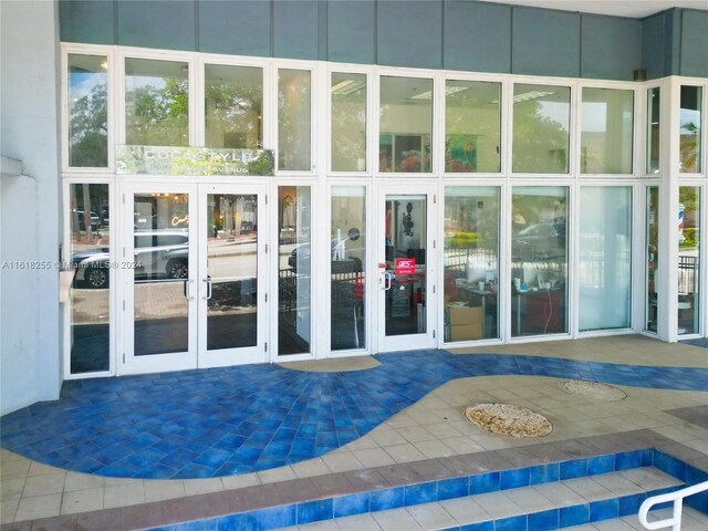 doorway to property with a patio and french doors