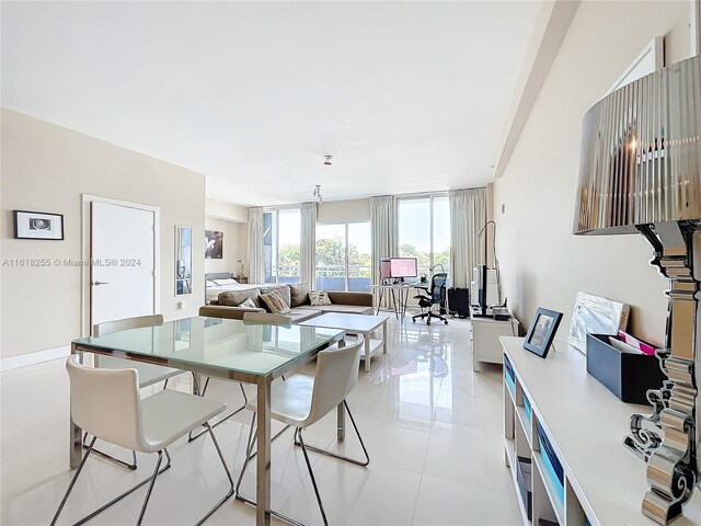 dining space with light tile patterned floors