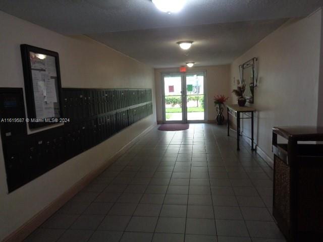 corridor with tile patterned floors