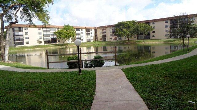 view of building exterior featuring a water view