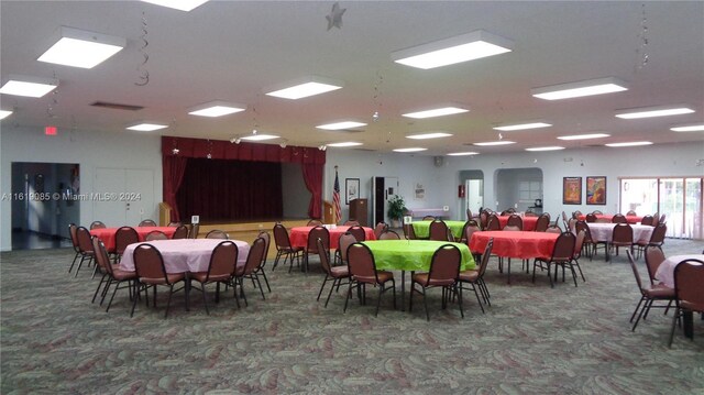 view of carpeted dining area