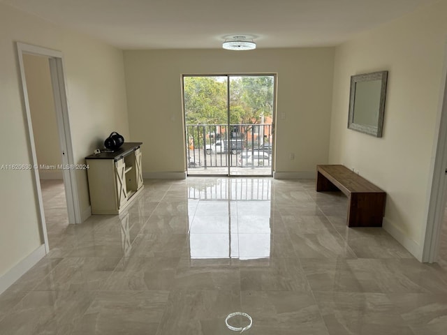 view of tiled spare room