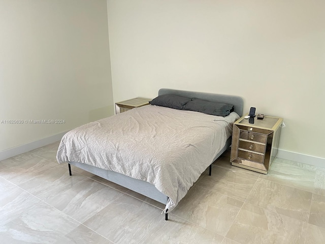 bedroom with baseboards