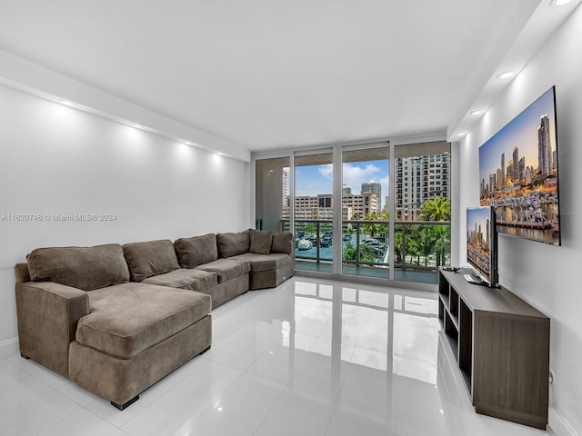 tiled living room with expansive windows