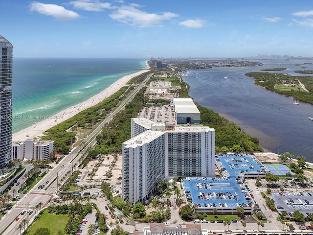 aerial view featuring a view of the beach and a water view