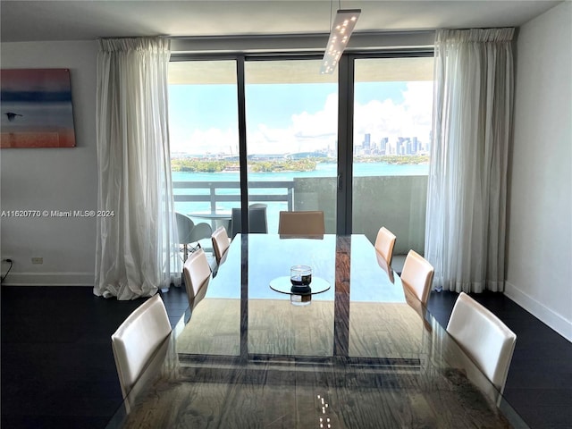 dining space with a water view