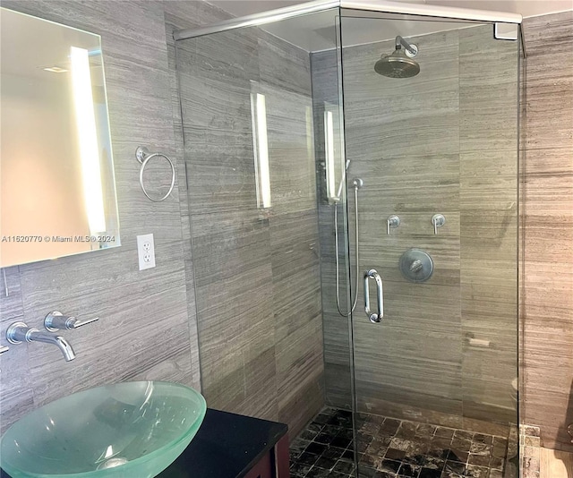 bathroom featuring vanity and walk in shower