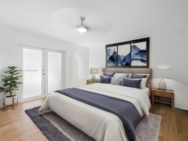 bedroom featuring ceiling fan and hardwood / wood-style floors