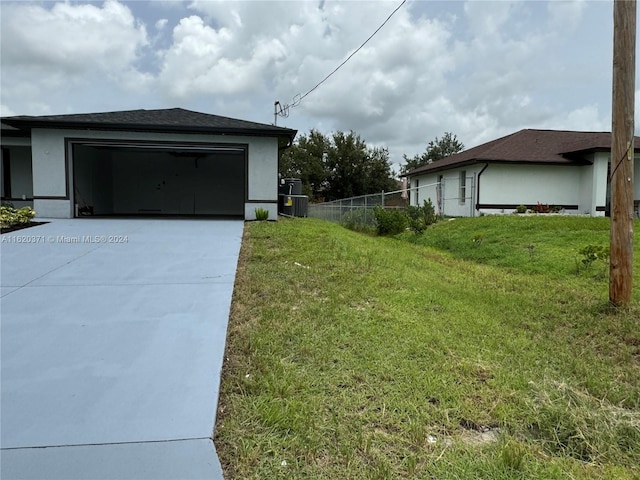 view of yard with a garage