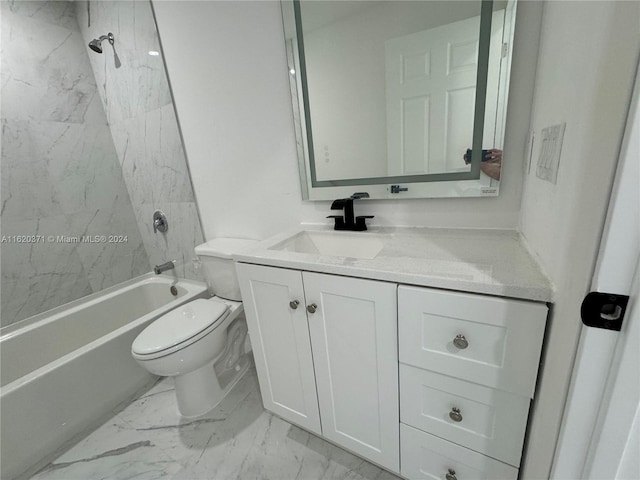 full bathroom featuring vanity, tiled shower / bath, and toilet