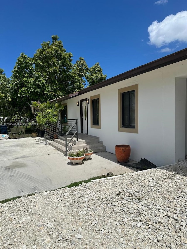 back of house featuring a patio area