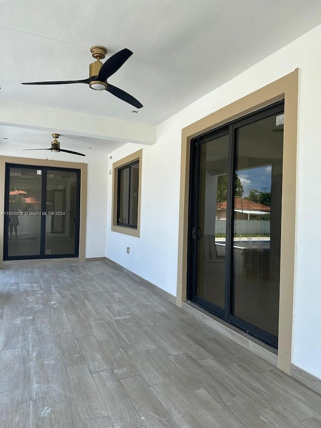 view of patio with ceiling fan