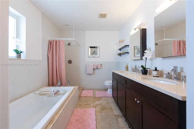 full bathroom with vanity, separate shower and tub, tile patterned floors, and toilet