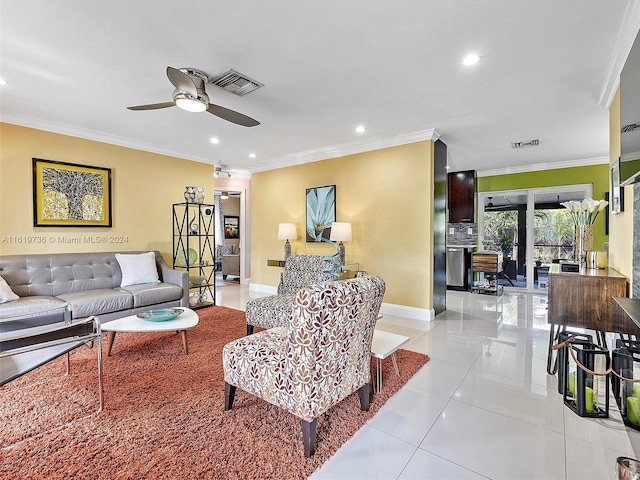 tiled living room featuring crown molding and ceiling fan